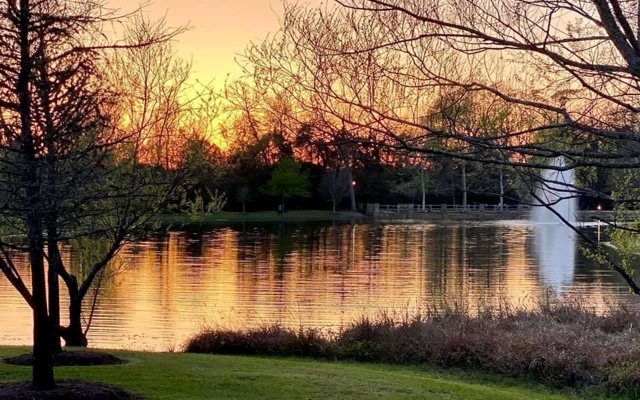 a white fountain sprays water high into the air