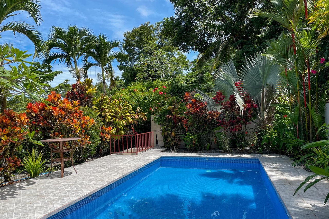 Turnkey Spacious Home with Open Layout, Pool & Small Ocean View in Ojochal Gated Community