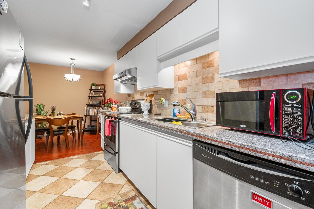 203-7694 Evans Rd