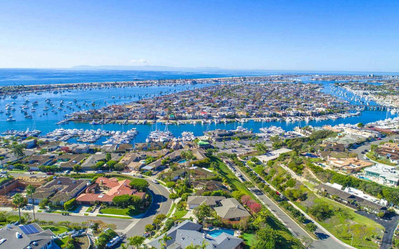 Aerial view of Newport Beach harbor and oceanfront homes