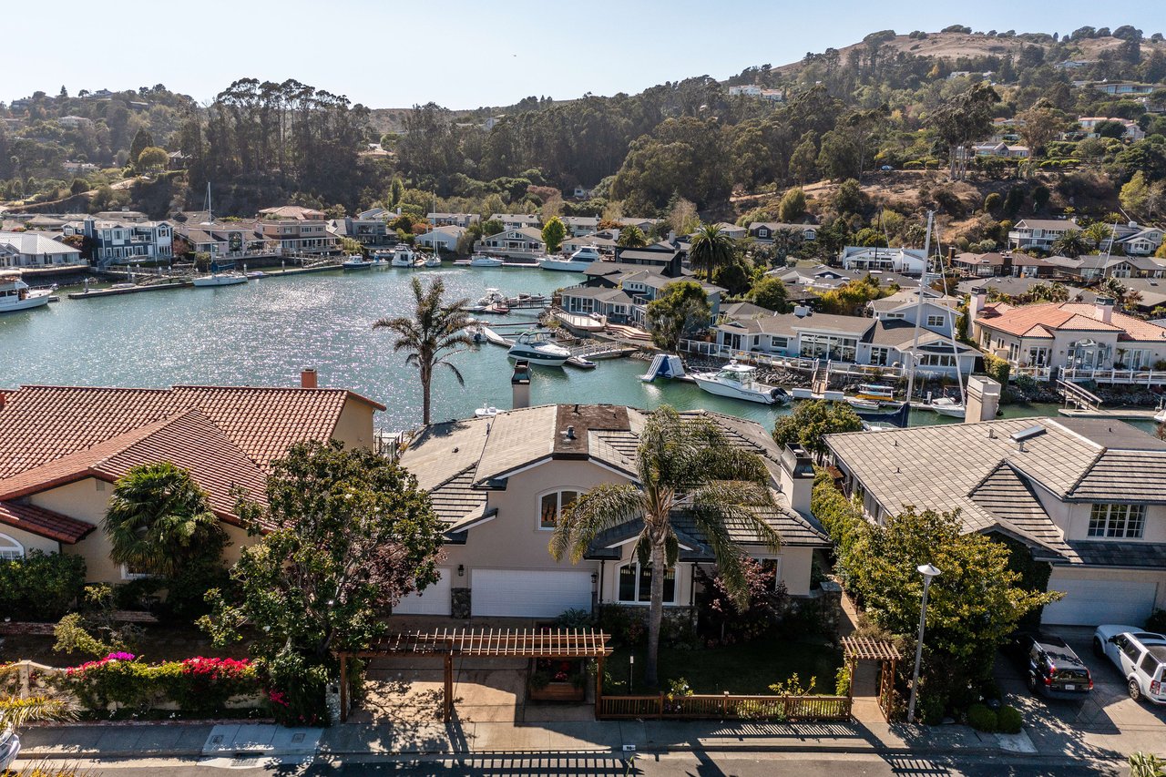 Sun-Drenched Home on Coveted Water Cul-de-Sac- Represented Buyer