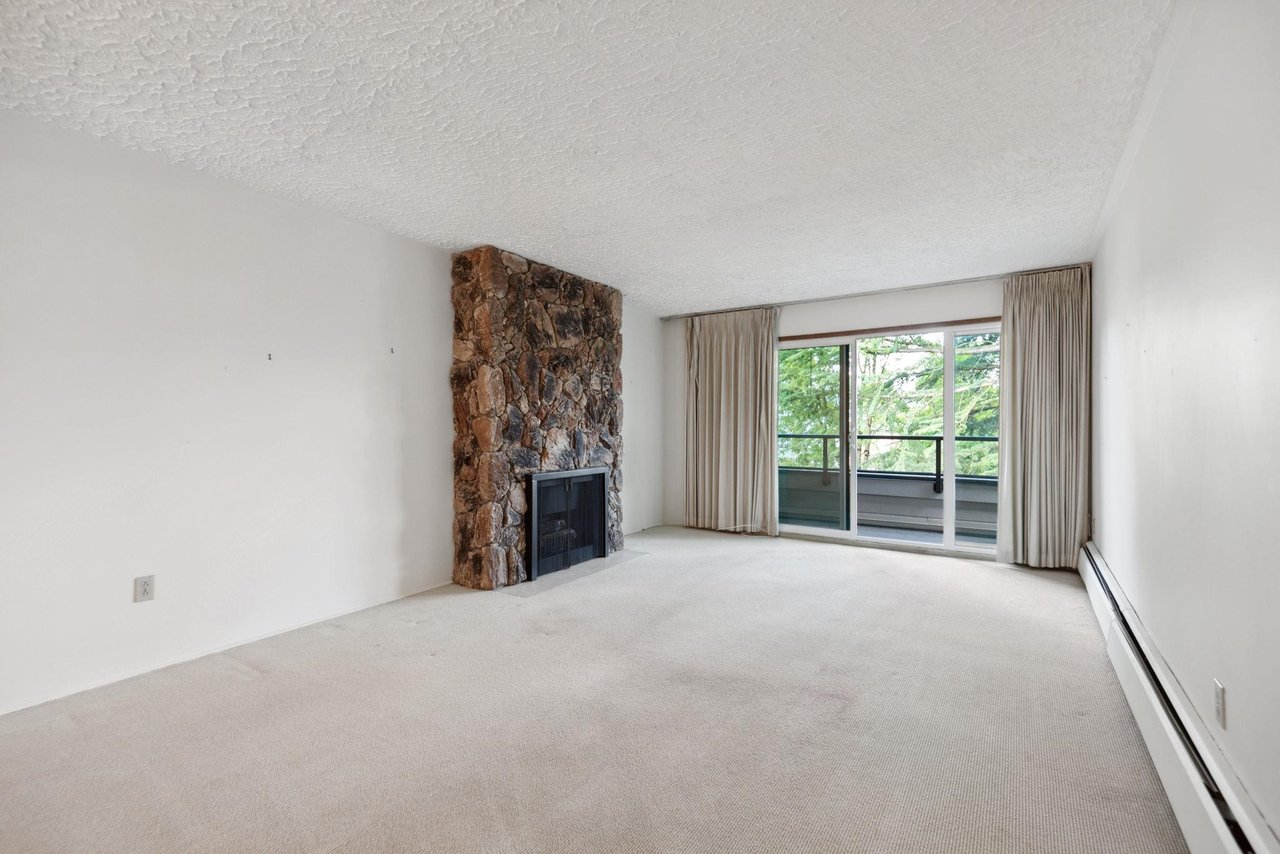 303-1266 W 13th Ave