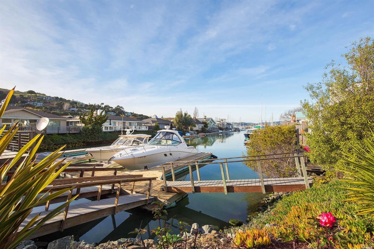 Dramatic Waterfront Home with Private Boat Slip- Represented Buyer