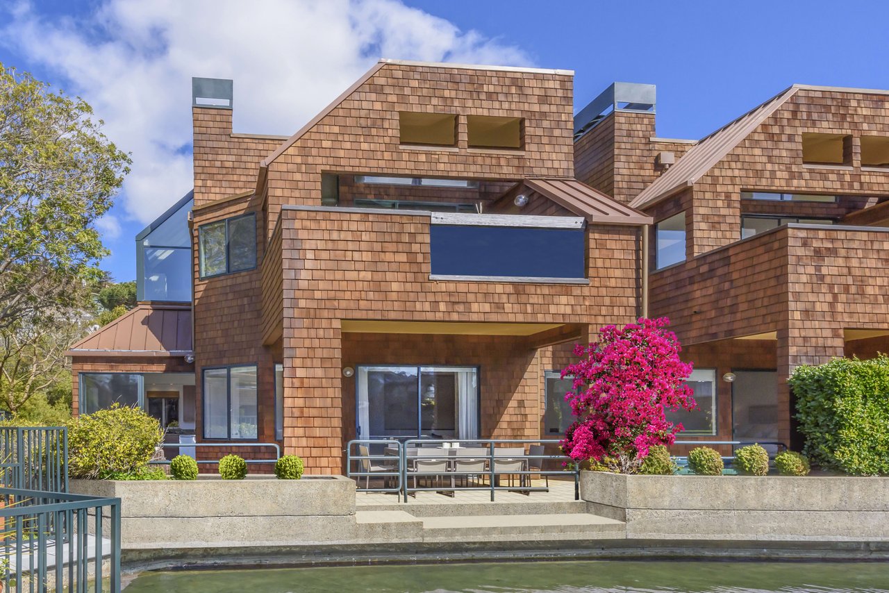 Impeccable Waterfront Lagoon Condominium- Represented Seller