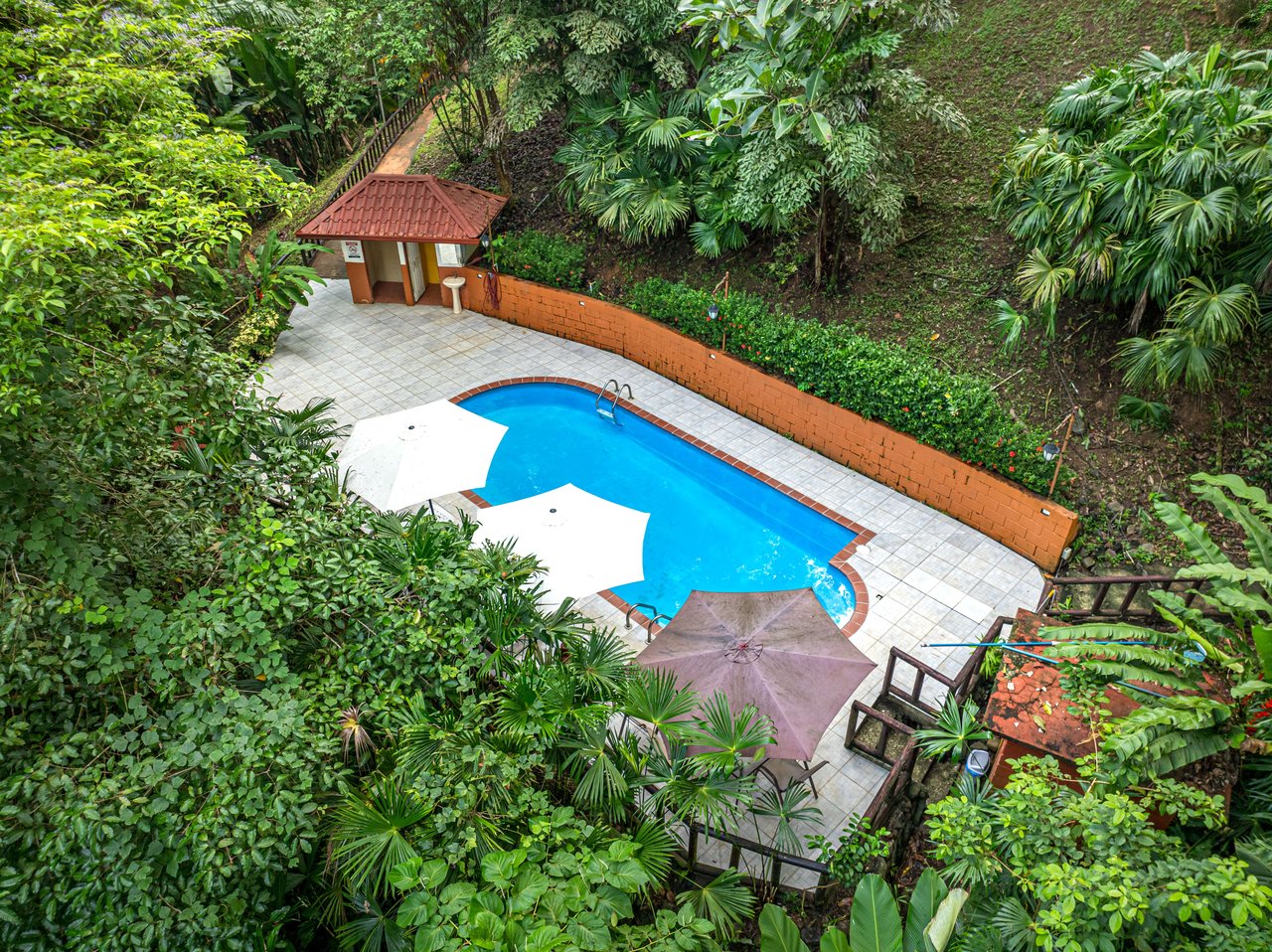 10-Acre Uvita Commercial Property with Existing Hotel & Highway Frontage – Development Potential Near the Beach