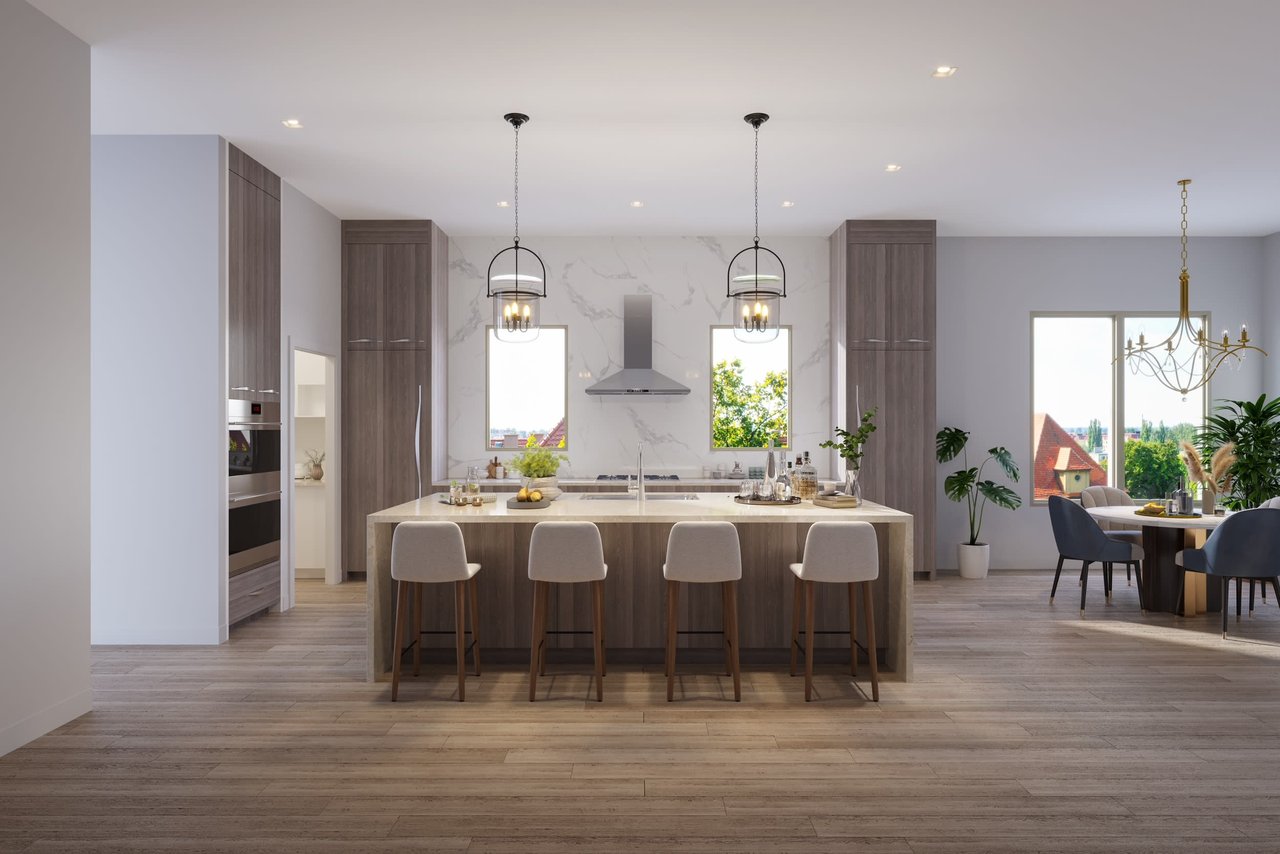 Beautiful modern kitchen in custom Dallas home, featuring white countertops, 4 stools, and two eye-catching chandeliers.