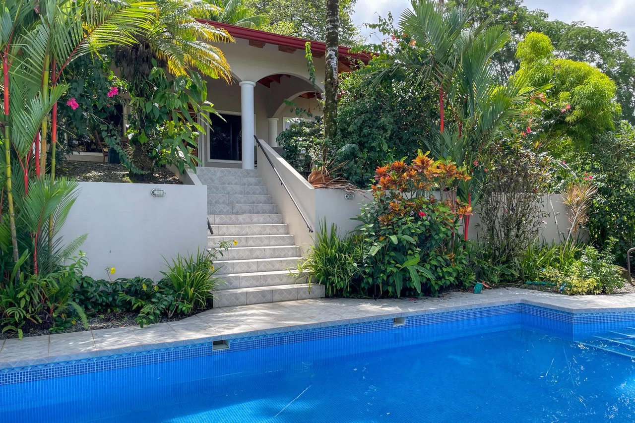 Turnkey Spacious Home with Open Layout, Pool & Small Ocean View in Ojochal Gated Community