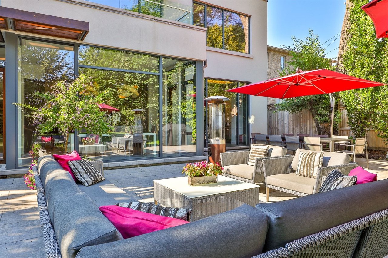 SOLD: Stunning and Sleek Design Built On Spectacular Lush Pie Shaped Lot
