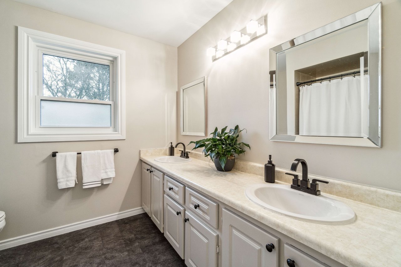 4 Bedroom Home located on a Quiet Court backing onto Greenspace