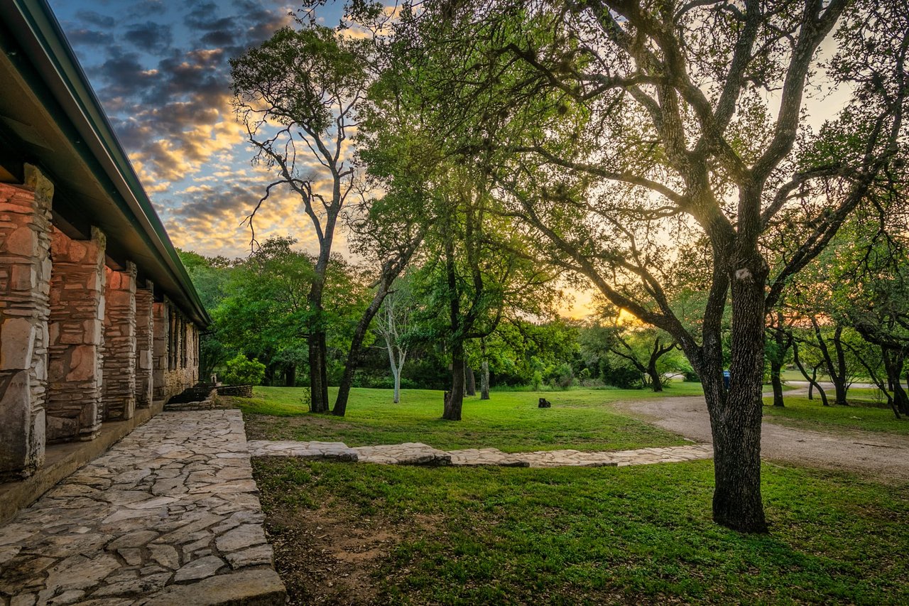 Updated, unrestricted Hillcountry Gem nestled in the Live Oak Trees