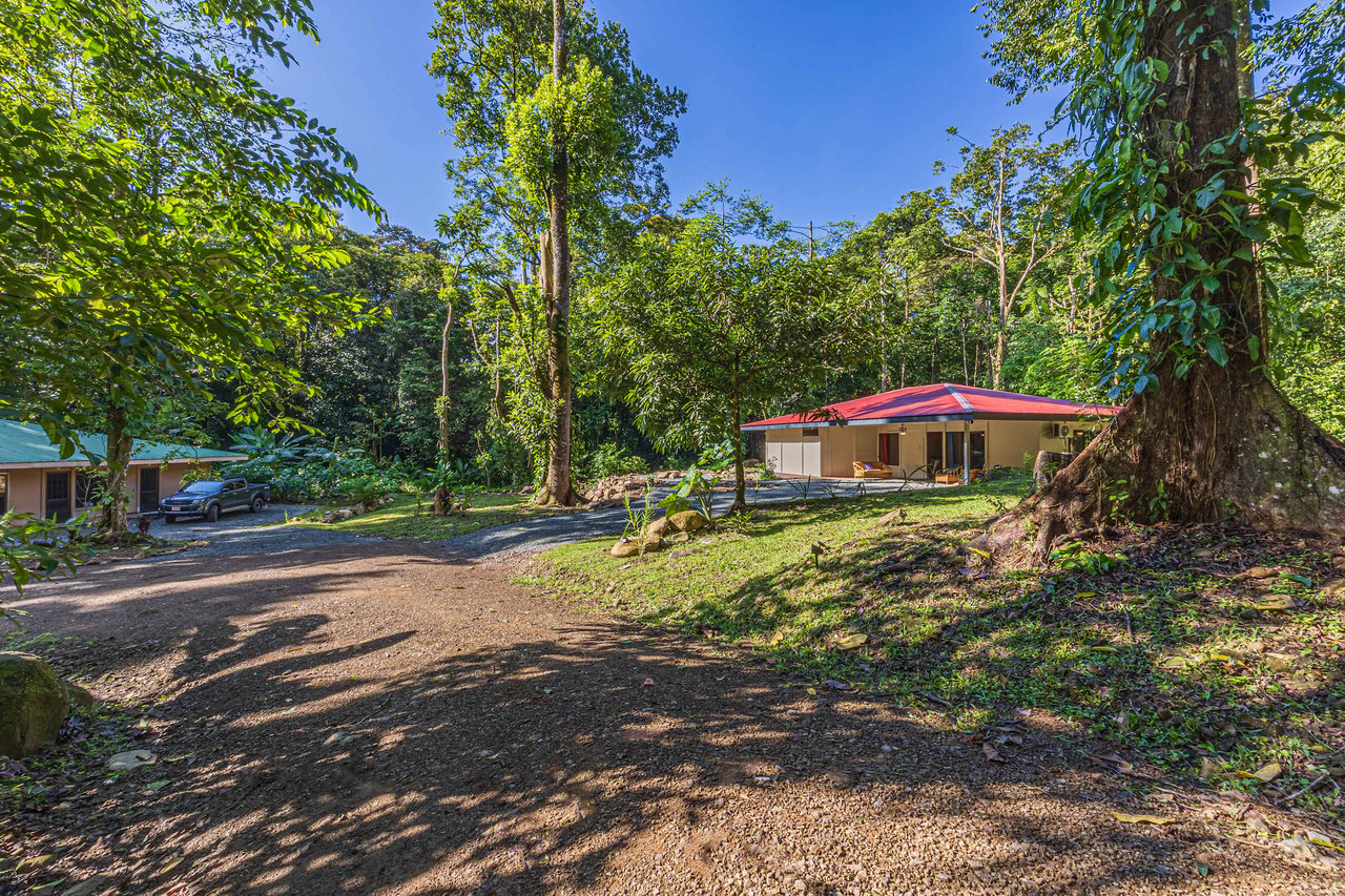 Versatile Riverfront Retreat: 5.3 Acre Rare Gem with Multiple Homes 