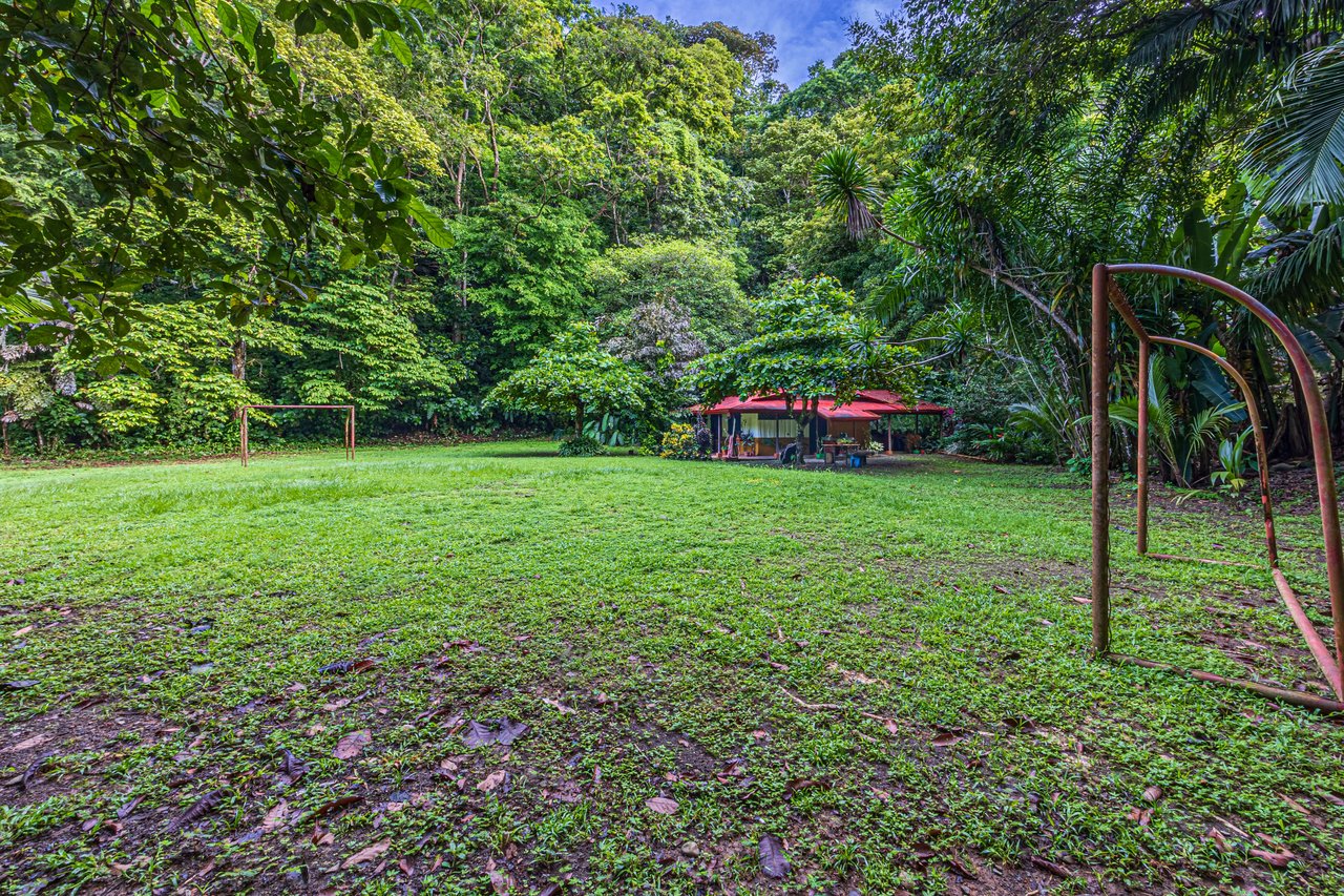 10-Acre Uvita Commercial Property with Existing Hotel & Highway Frontage – Development Potential Near the Beach