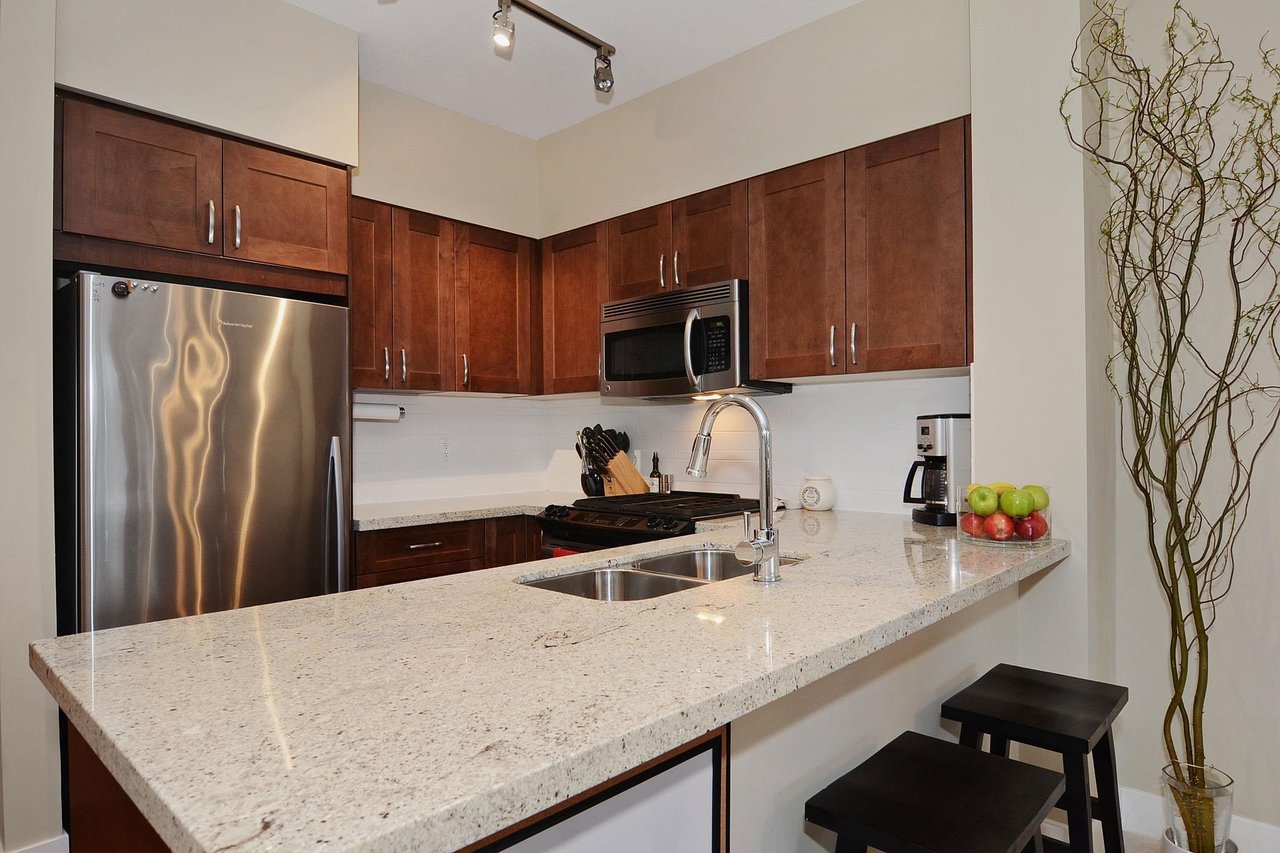 310-1111 E 27th St