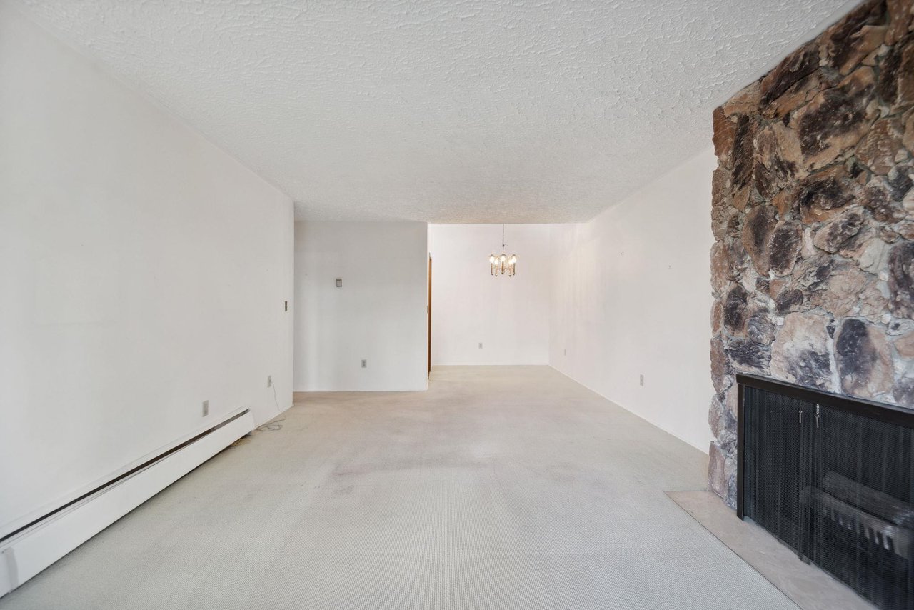 303-1266 W 13th Ave