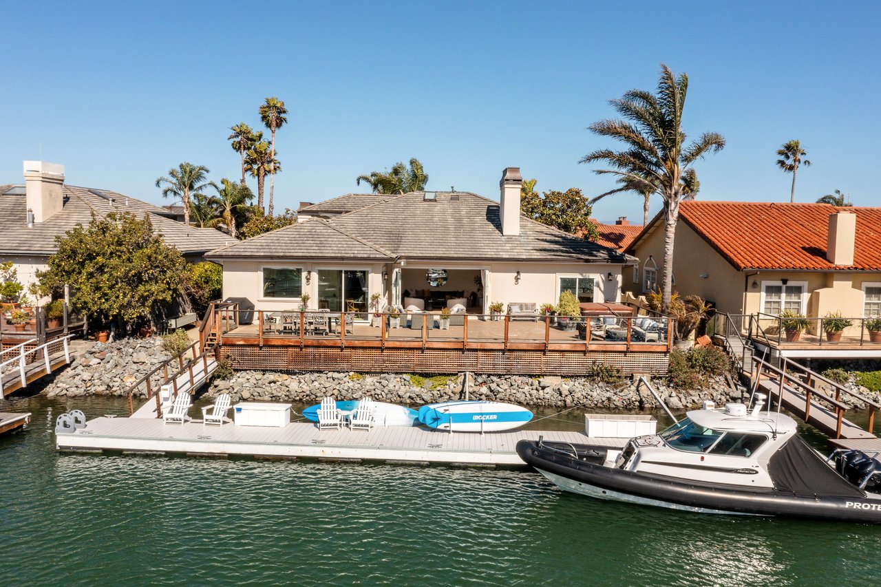 Sun-Drenched Home on Coveted Water Cul-de-Sac- Represented Buyer