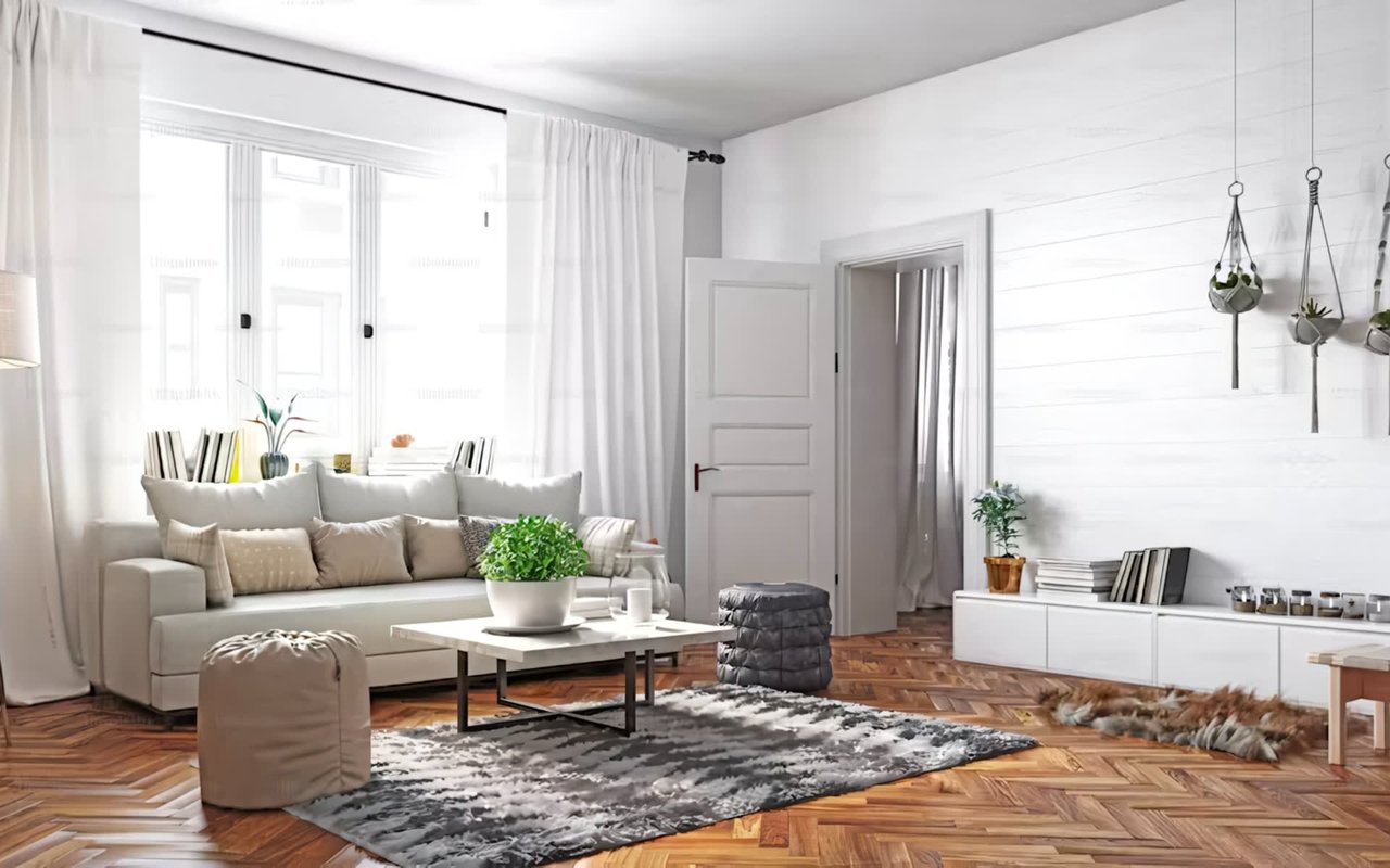 A modern, minimalist-style living room with a couch, coffee table, several potted plants, and large windows.
