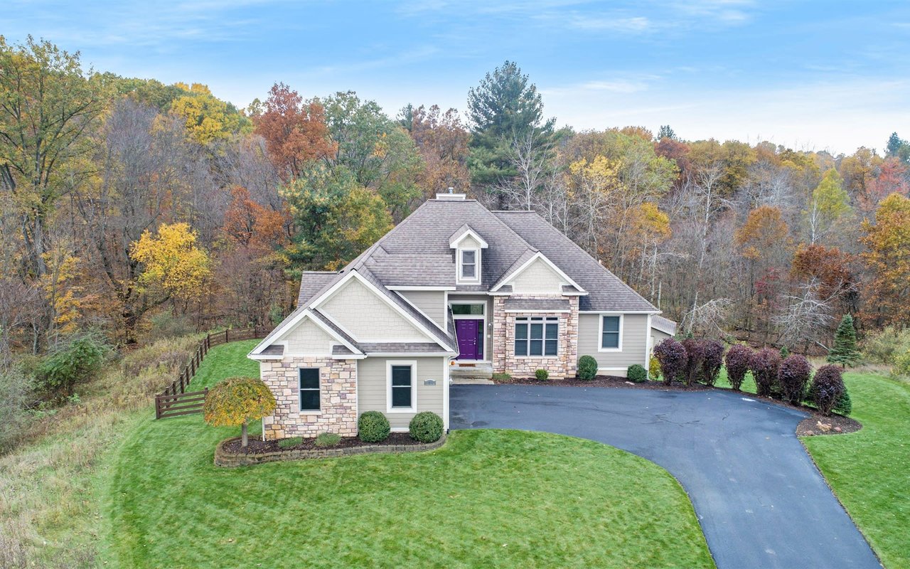 aerial photo of a single-family house with large lawn in Rockford