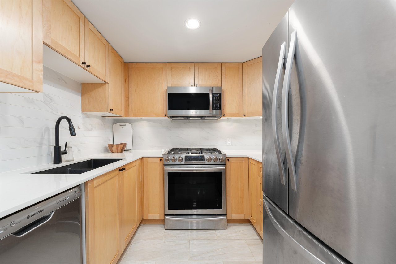 604-1425 W 6th Ave