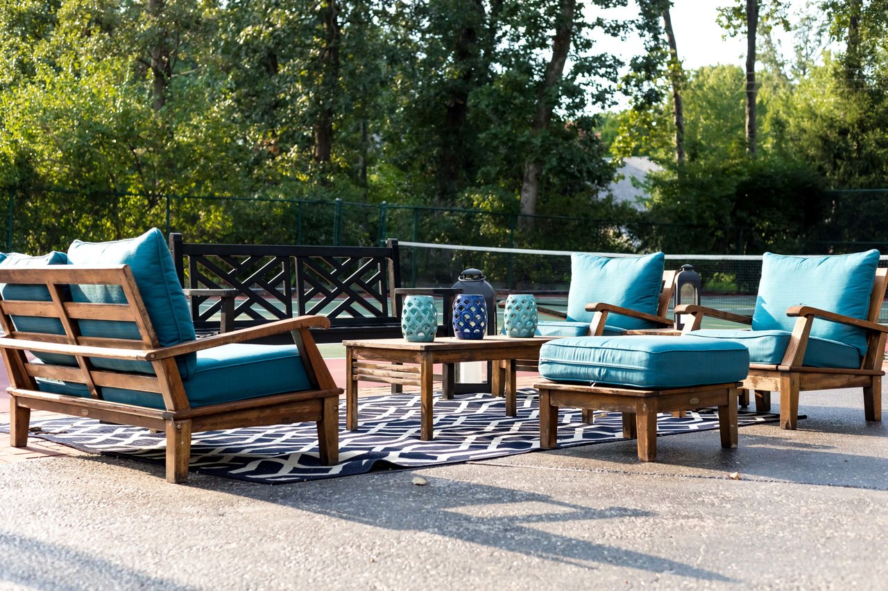 A Special Retreat on a Prized One Acre Lot With Pool and Tennis Court