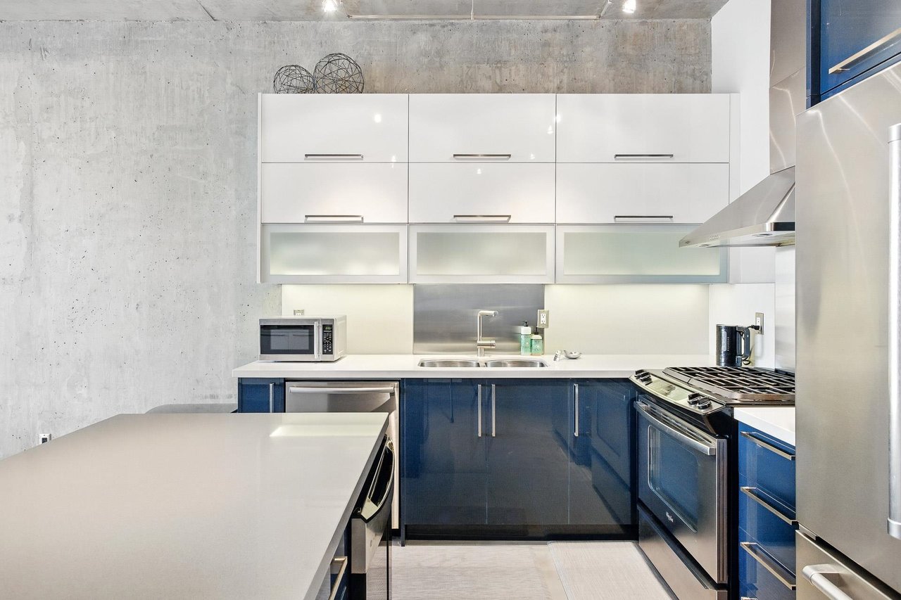 303-128 W 6th Ave