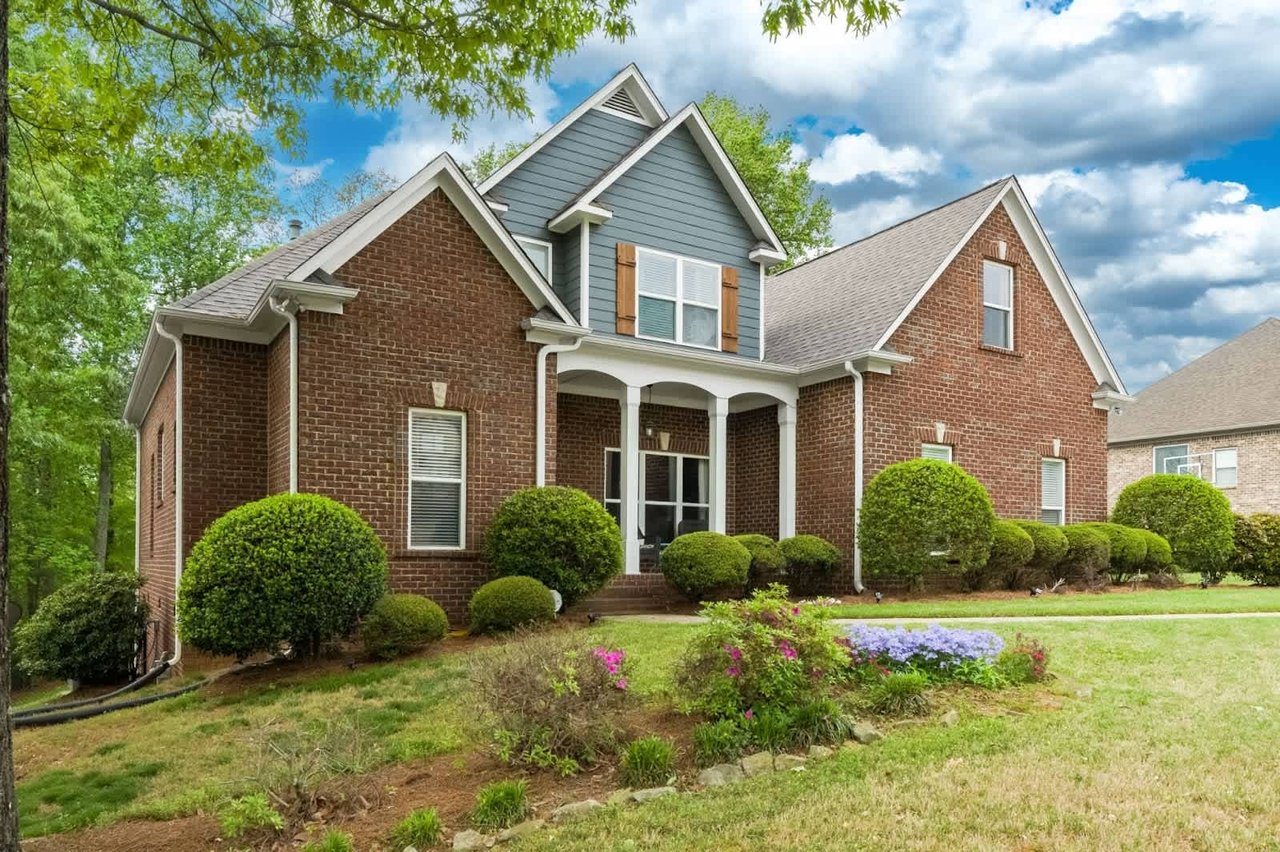 Navigating the Waves: How Interest Rates Impact the Real Estate Market and Tips for Buyers