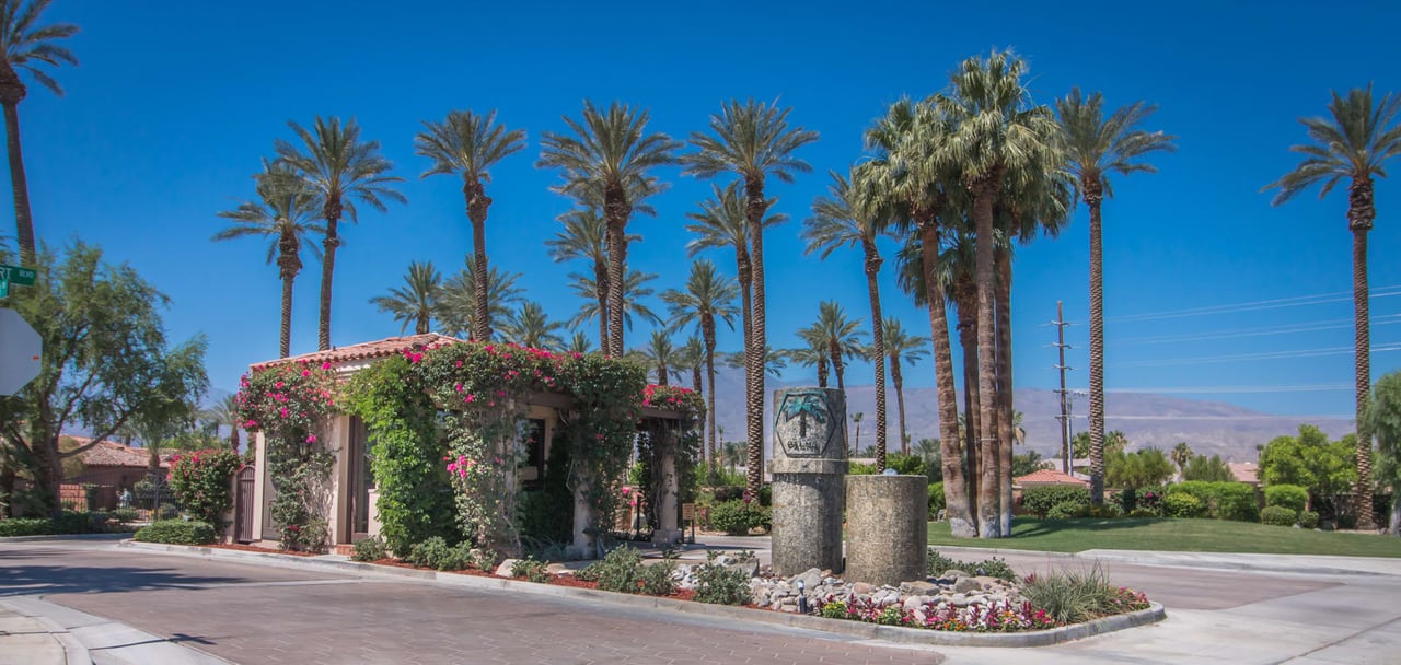 A grand entrance to a golf course community.