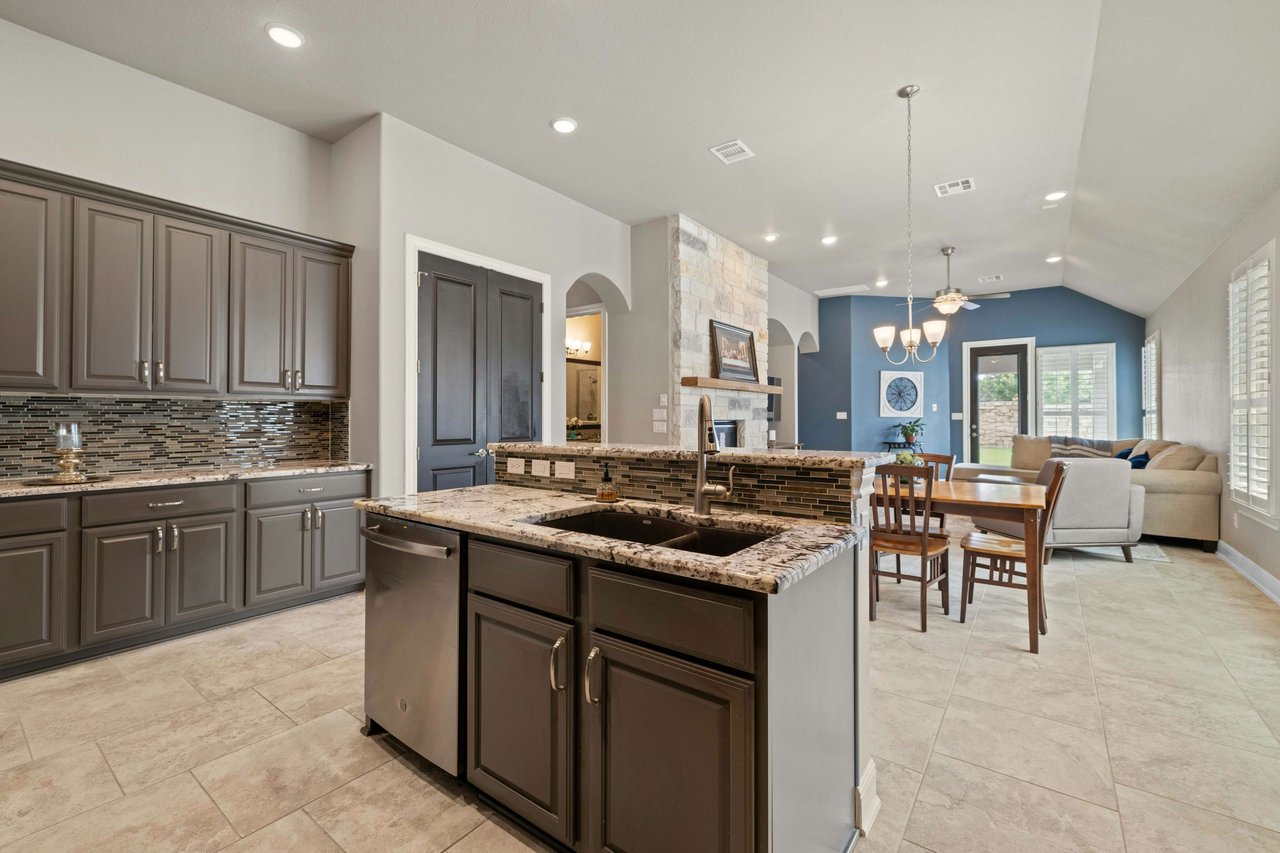 Impeccably Maintained 1-Story Taylor Morrison Home with Luxurious Amenities in Desirable Travisso Neighborhood!