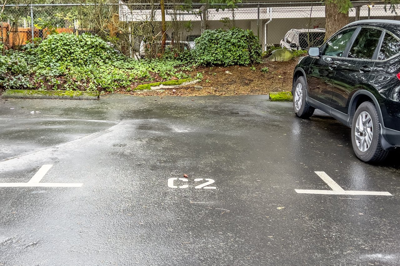 Convenient guest parking is assigned, ensuring hassle-free visits for friends and family to Echo Lake Townhomes.