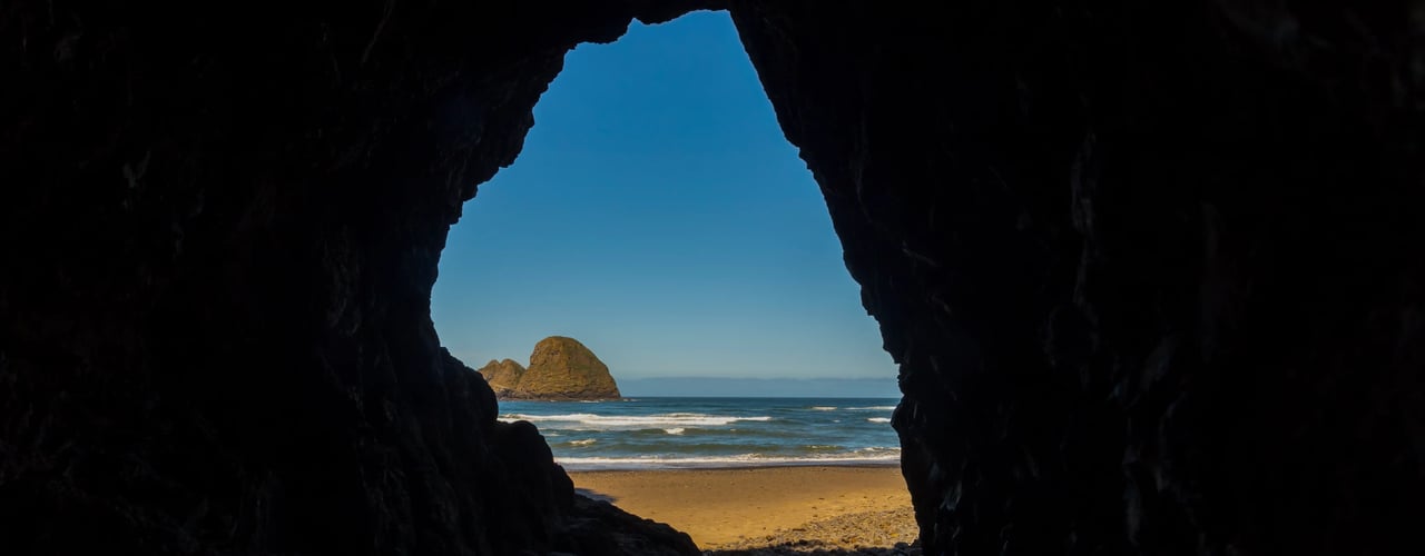 Oceanside Oregon beach view from inside the cave