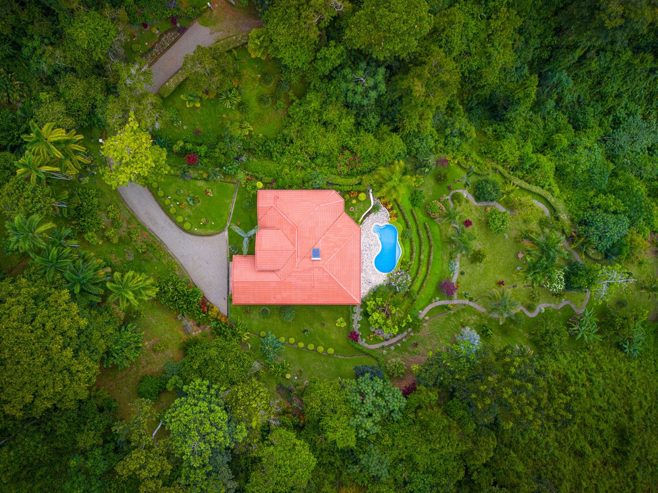 Beautiful 4500 sq ft home on 3.5 acres, gated community, expansive ocean, valley, and jungle views!