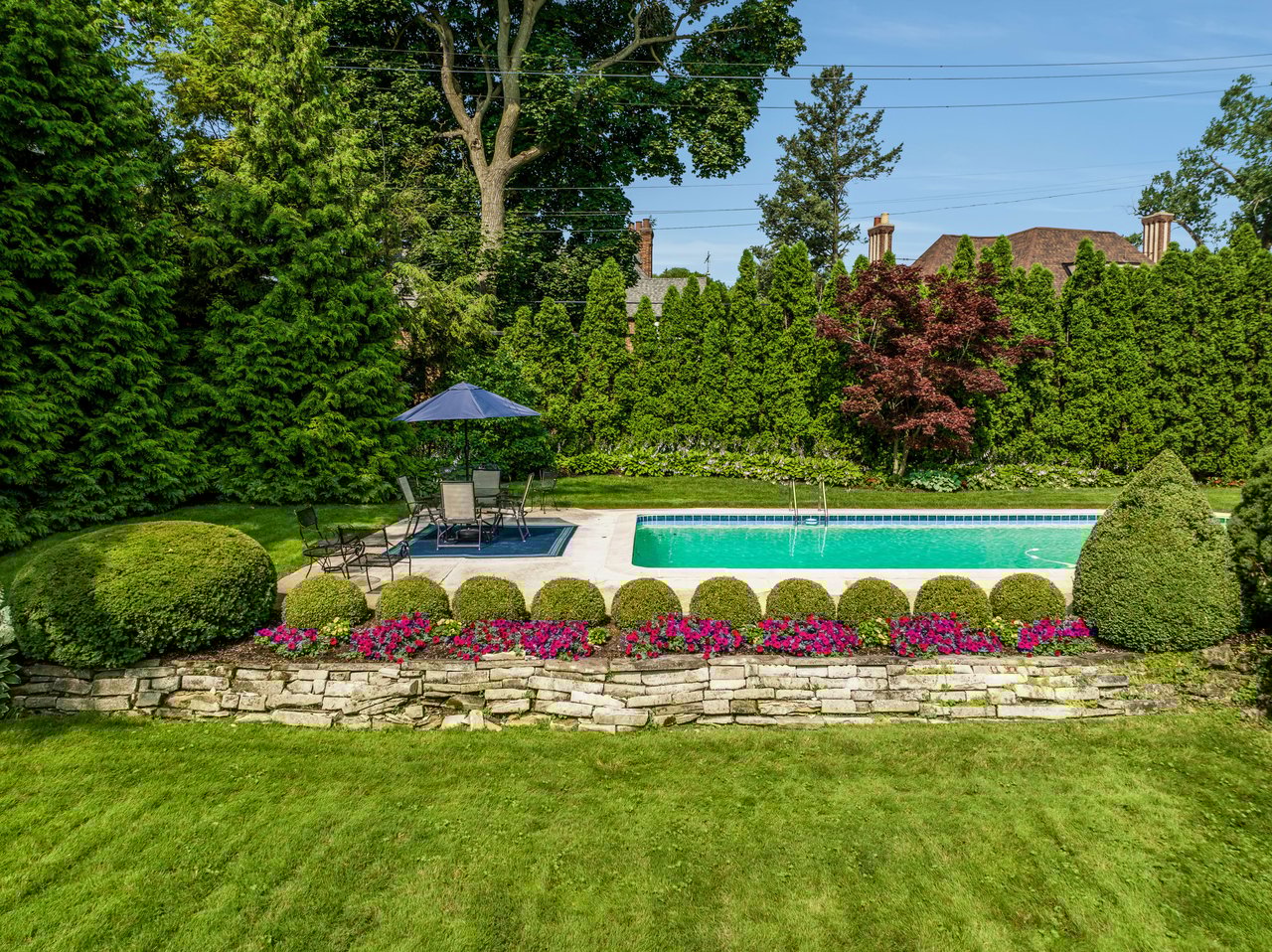 1921 Greek Revival! Manicured grounds with pool! $1.1 Million in Detroit’s Palmer Woods