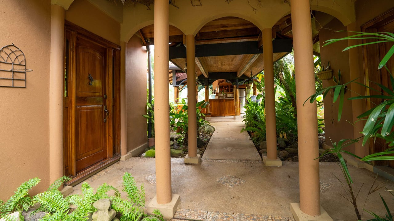 Stunning Tropical Home in Gated community with Hundreds of fruit trees  