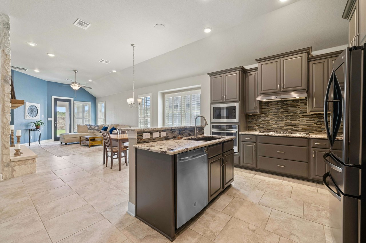 Impeccably Maintained 1-Story Taylor Morrison Home with Luxurious Amenities in Desirable Travisso Neighborhood!