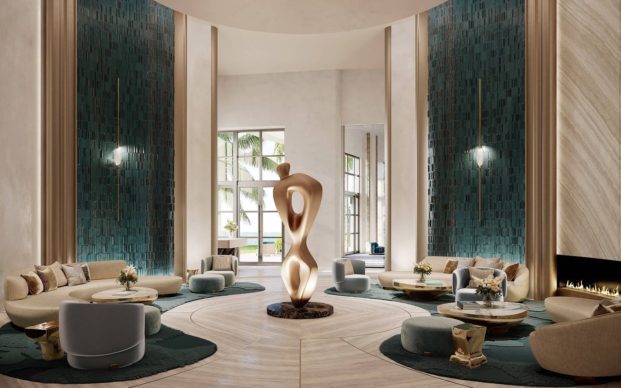St. Regis Miami Residences lobby with teal tile walls and a sculptural centerpiece.