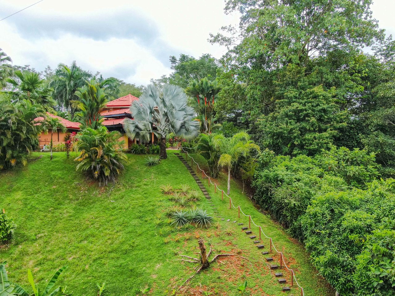 Stunning Tropical Home in Gated community with Hundreds of fruit trees  