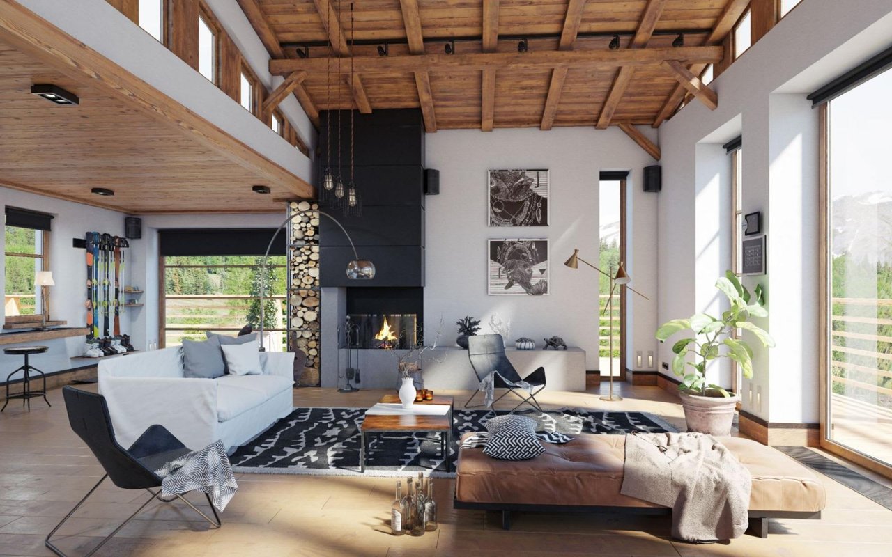 Living room with wood accents, featuring a fireplace, large windows, and a comfortable seating area.