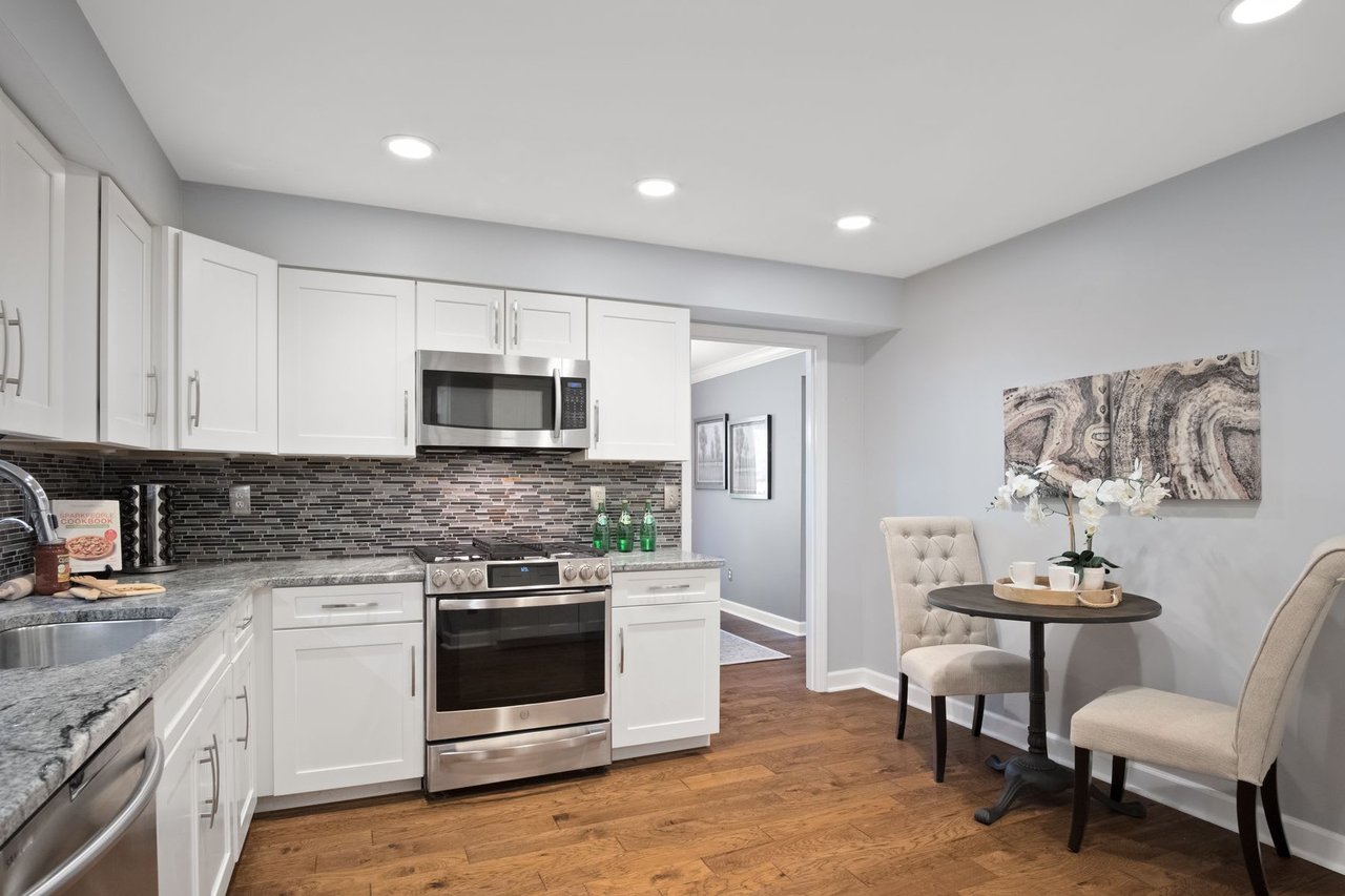 Closed in 24 Days for 7% Over List Price! First Floor Condo Living Overlooking Golf Course 