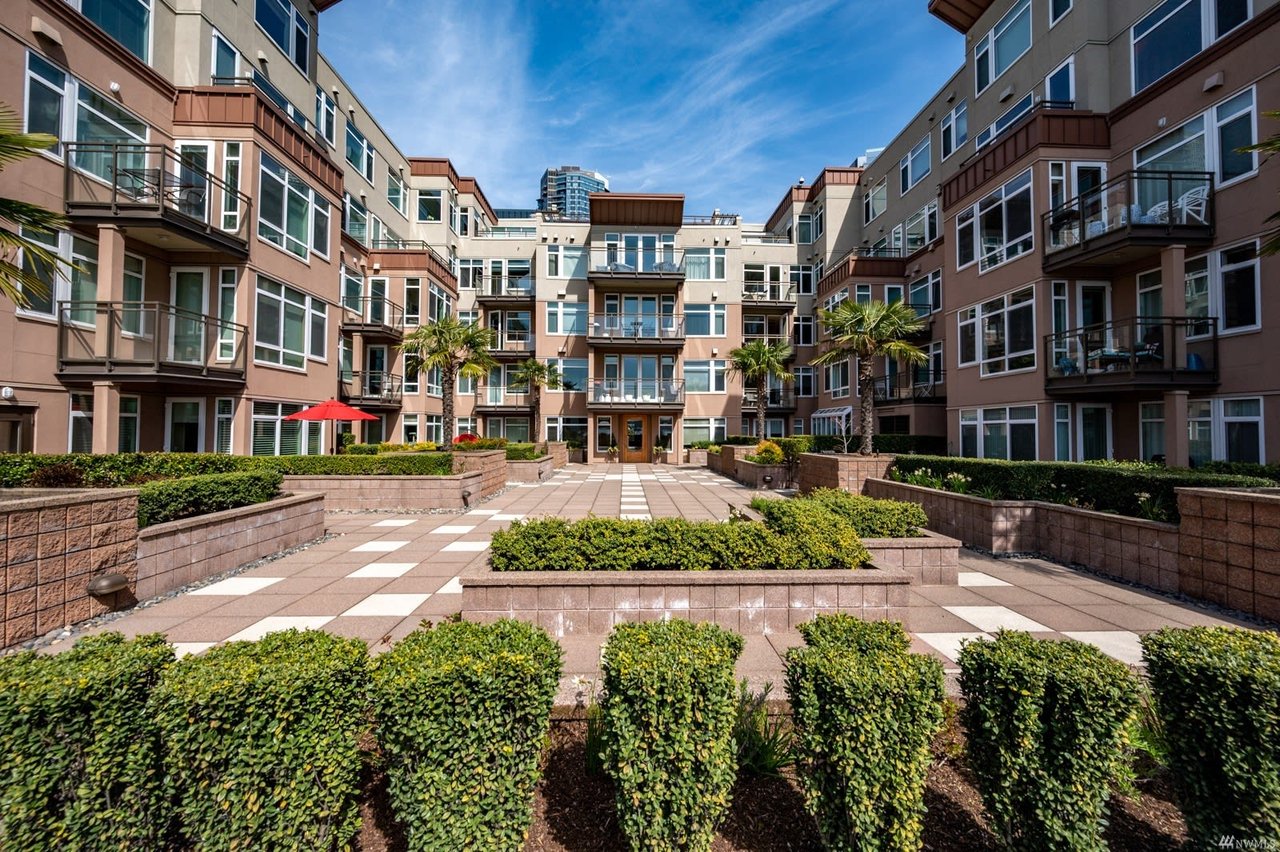 Sun-drenched condo with expansive balcony terrace, perfect for indoor-outdoor living. 