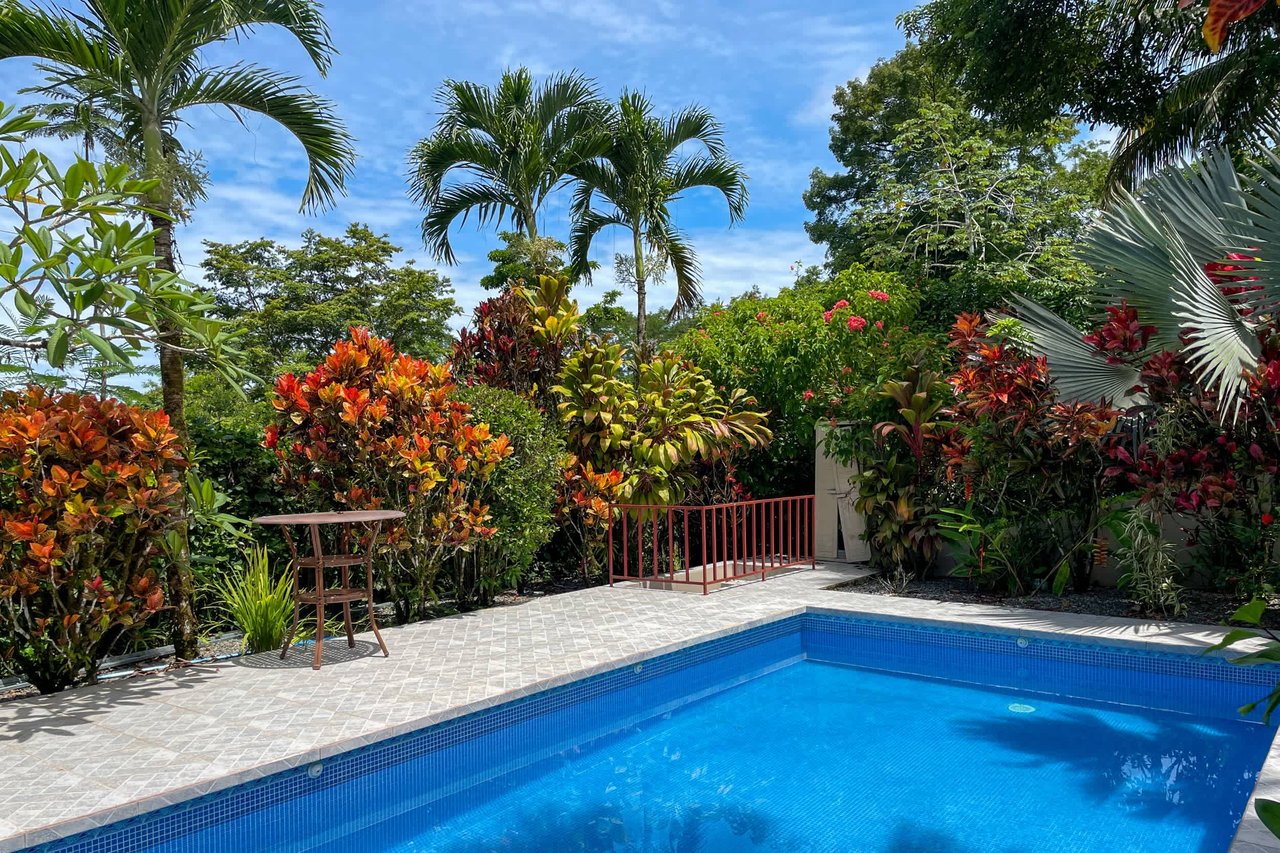 Turnkey Spacious Home with Open Layout, Pool & Small Ocean View in Ojochal Gated Community