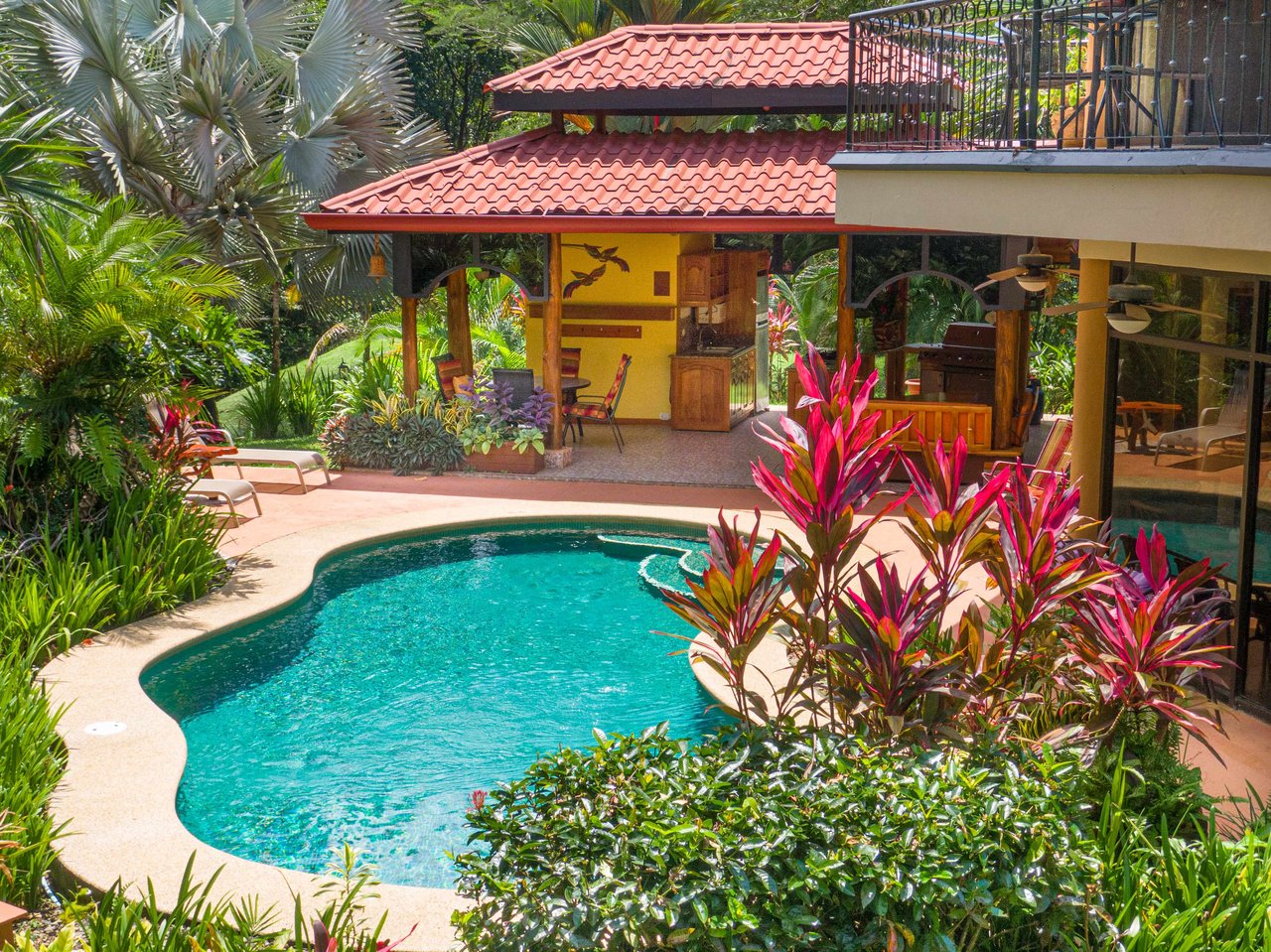 Stunning Tropical Home in Gated community with Hundreds of fruit trees  