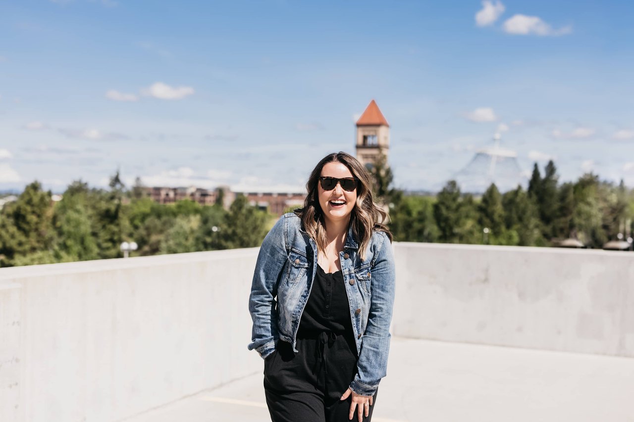 Samara Behler in Downtown Spokane, WA with the clock tower in the distance