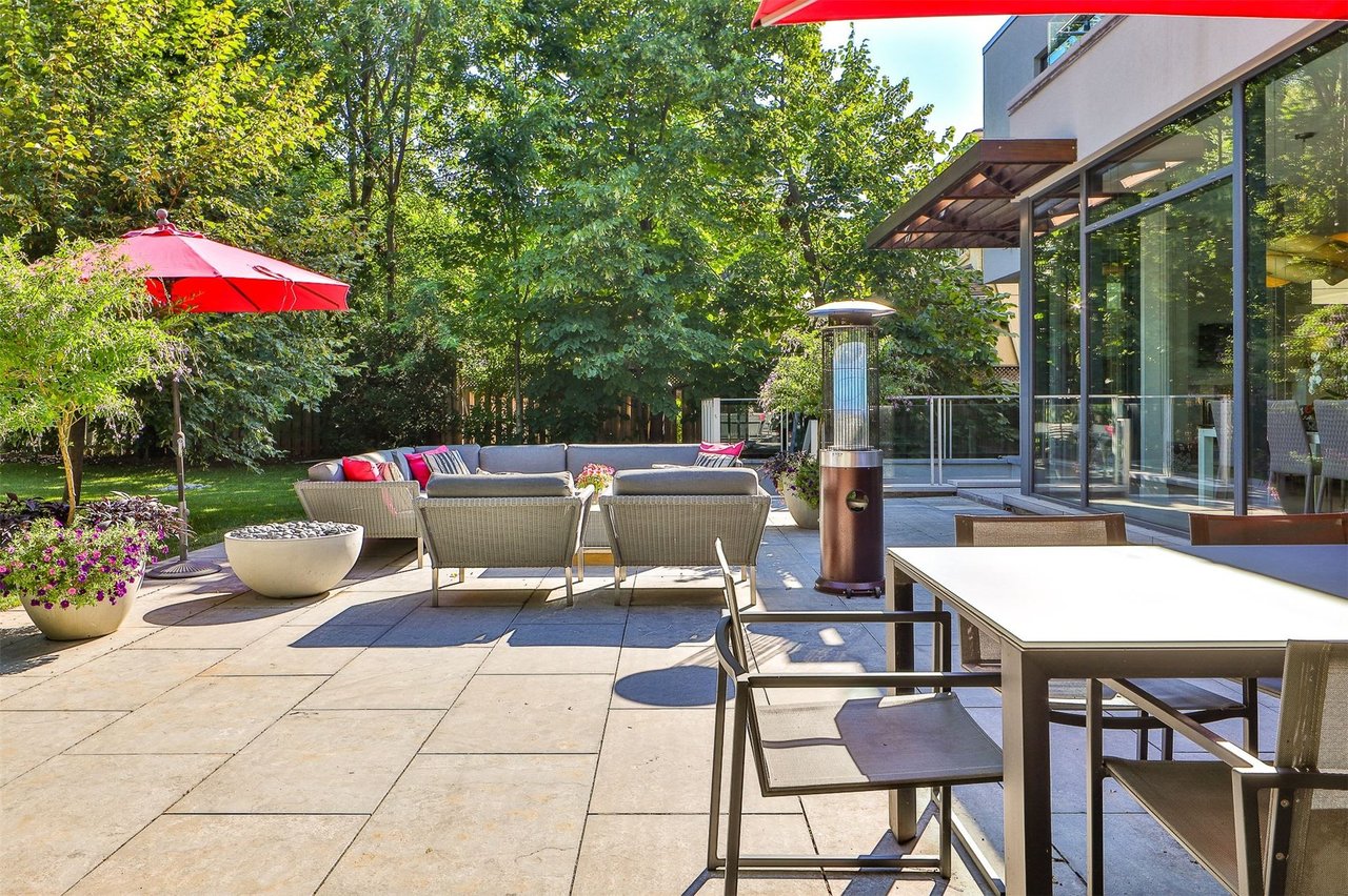 SOLD: Stunning and Sleek Design Built On Spectacular Lush Pie Shaped Lot