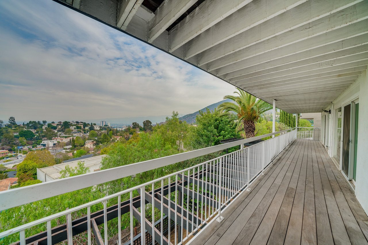 Mid Century with Potential in Lovely Lake Hollywood