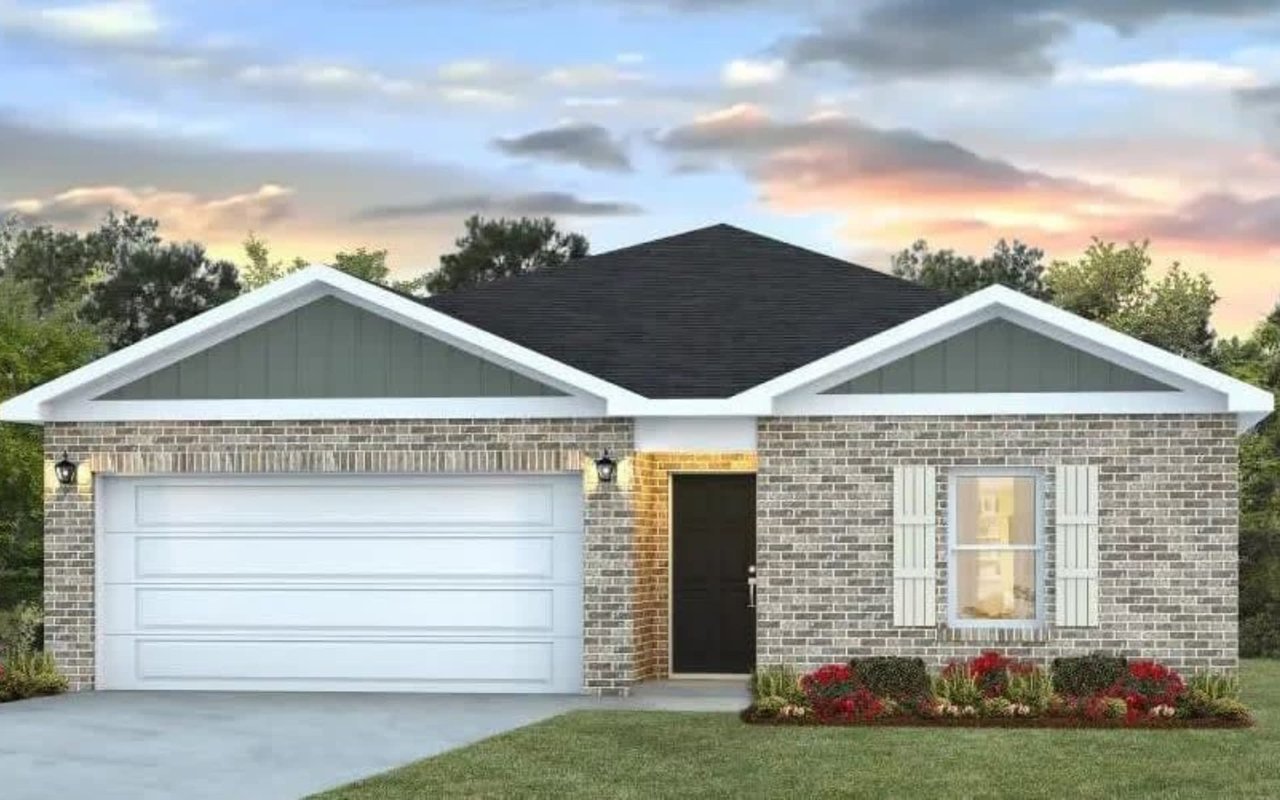 A one-story, ranch-style house with a brick facade, a front porch, a white garage door