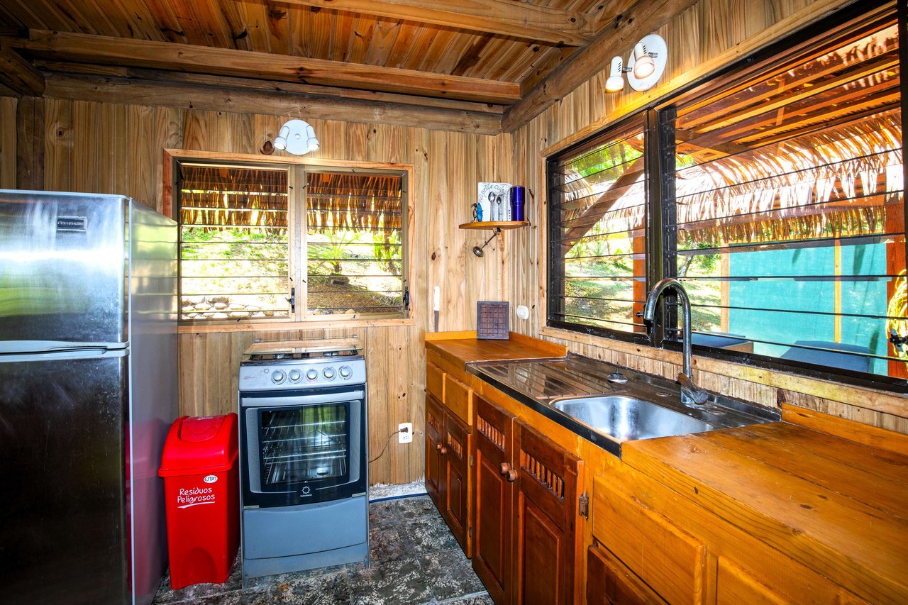 A MONEY MAKER! Location, home, guest cabins, with a SUCCE$$FUL exclusive distribution agency!