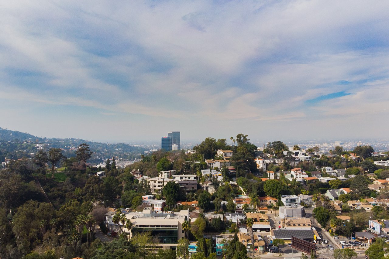 Mid Century with Potential in Lovely Lake Hollywood