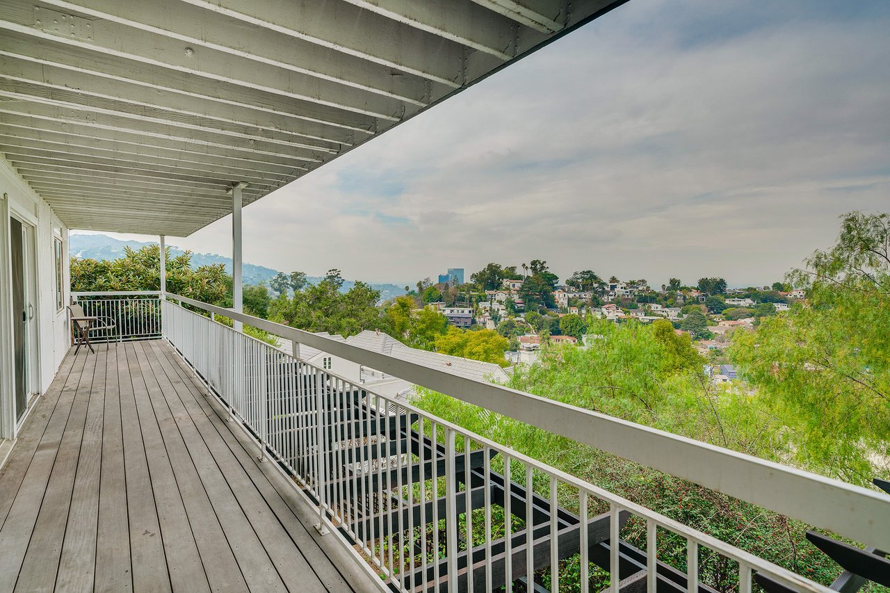 Mid Century with Potential in Lovely Lake Hollywood