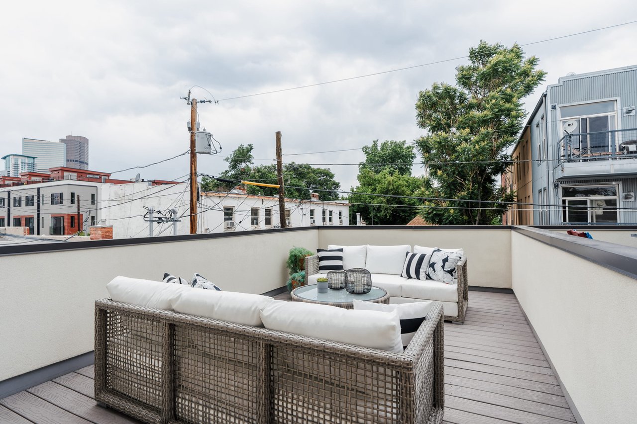 Check it out! Tastefully updated Five Points townhome