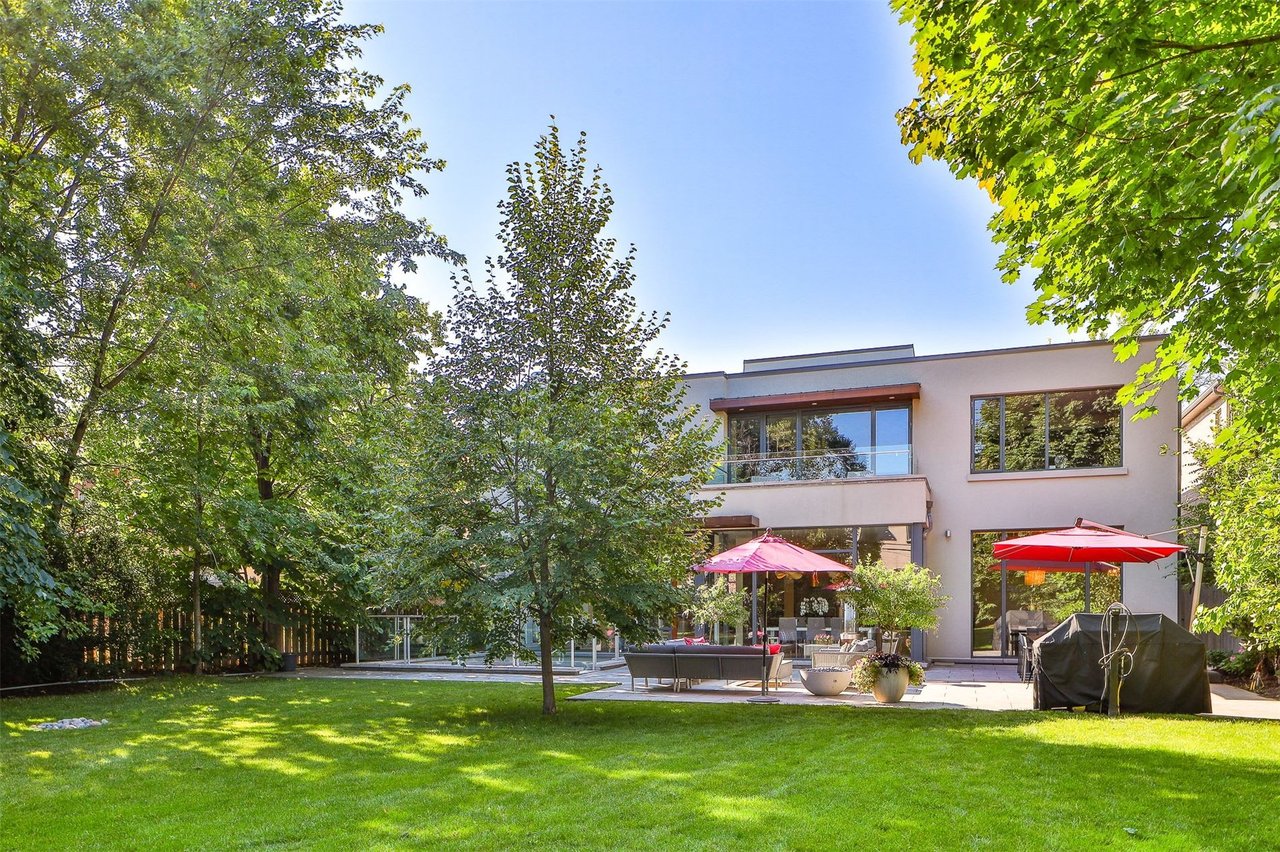 SOLD: Stunning and Sleek Design Built On Spectacular Lush Pie Shaped Lot