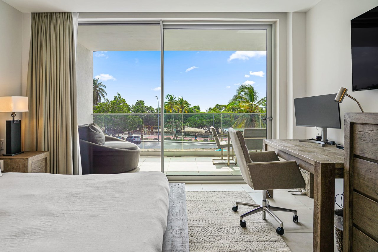 Discover Serene Luxury at O Condominium Aruba's Unit 13